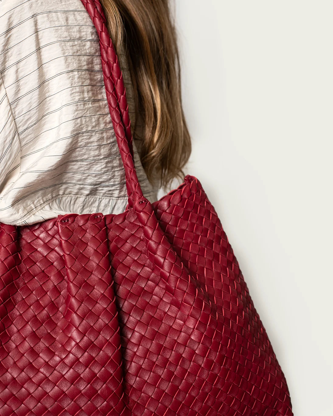 BURGUNDY BRAIDED LEATHER BAG